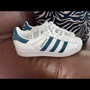 Teal/white Adidas Superstar